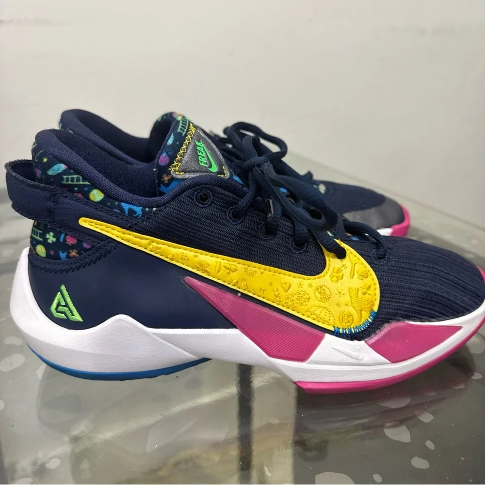 Nike Kids Navy Sneakers with Pink and Yellow Accents